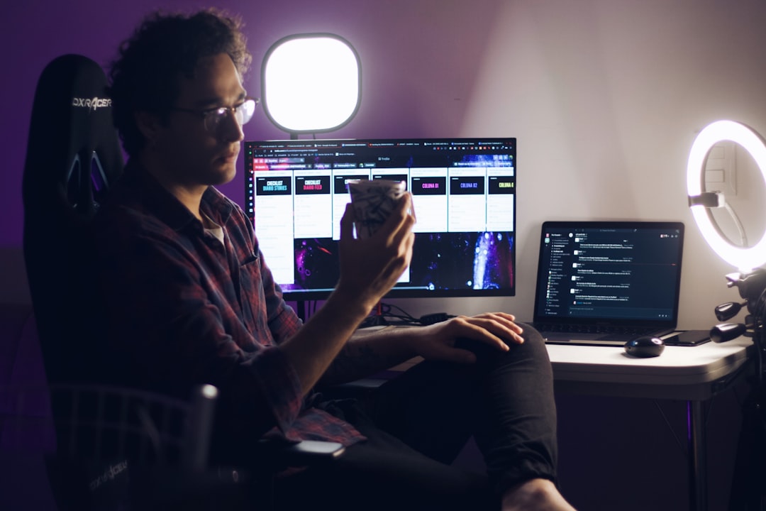 Professional investor in a modern, dimly lit office thoughtfully analyzes a complex, abstract data visualization on a larg...